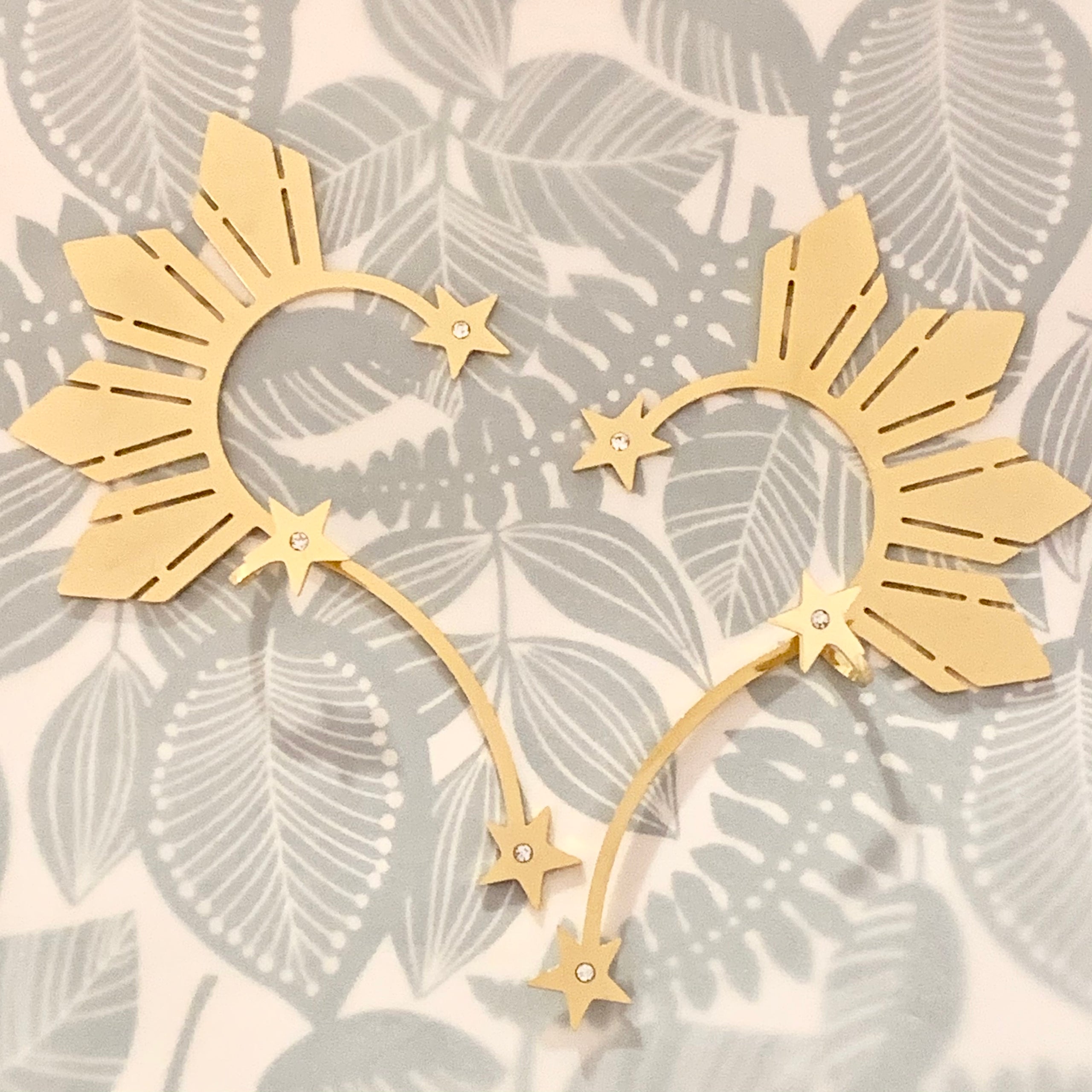 Three stars and a sun ear cuff for sale on sale